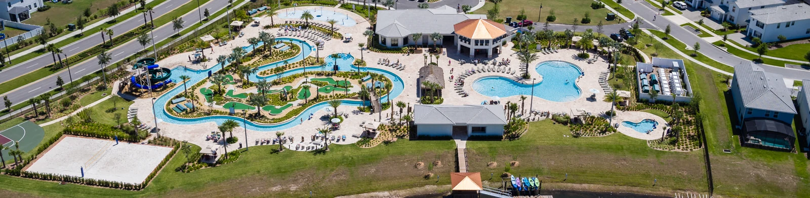 Aerial view of Storey Lake Resort swimming pools, lazy river and clubhouse