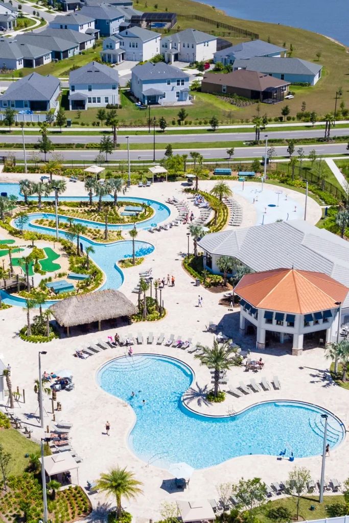 Aerial view of Storey Lake Resort swimming pools, lazy river and clubhouse